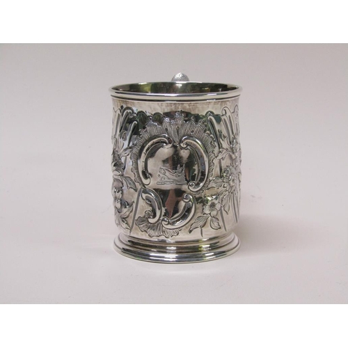 130 - An early Georgian silver tankard with later Victorian embossed decoration, makers mark for James Smi... 