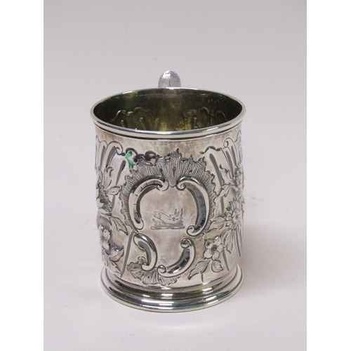 130 - An early Georgian silver tankard with later Victorian embossed decoration, makers mark for James Smi... 