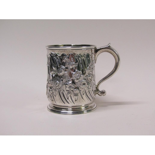 130 - An early Georgian silver tankard with later Victorian embossed decoration, makers mark for James Smi... 