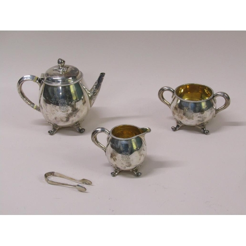 141 - A late Victorian three piece silver tea service in fitted box with a pair of tongs, makers mark for ... 