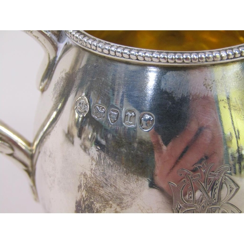 141 - A late Victorian three piece silver tea service in fitted box with a pair of tongs, makers mark for ... 