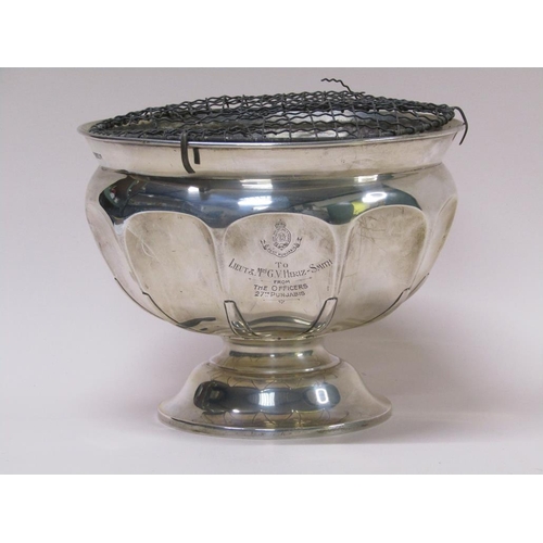 142 - An Edwardian silver rose bowl of lobed facet form, supported on a circular domed base, presentation ... 