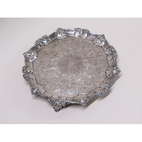 143 - An early Victorian silver salver of octagonal form with a raised and shaped border and engraved base... 