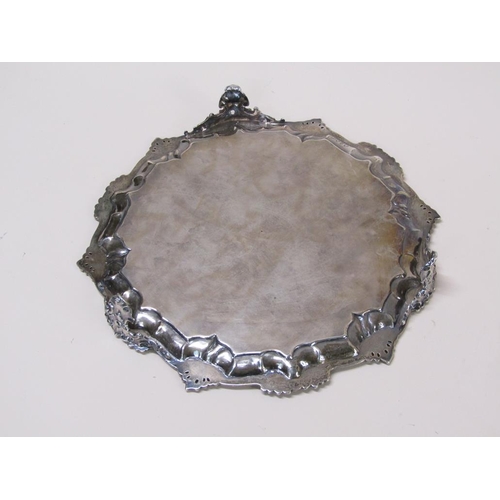 143 - An early Victorian silver salver of octagonal form with a raised and shaped border and engraved base... 