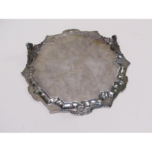 143 - An early Victorian silver salver of octagonal form with a raised and shaped border and engraved base... 