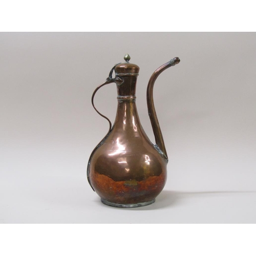 40 - An early 19c copper coffee pot of oriental form, 37cm h.