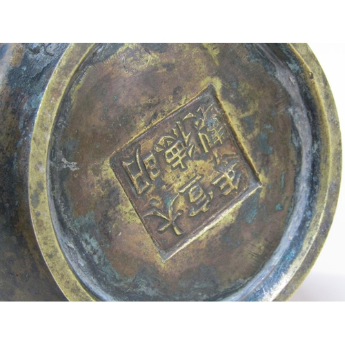 46 - An 18c/19c Chinese bronze vase with mythical beast masks, seal mark to base, 15cm h.