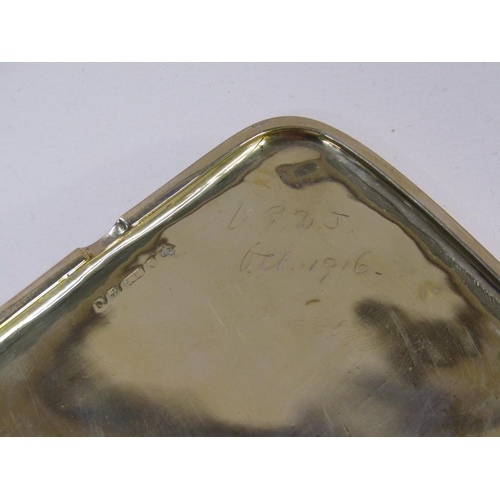 88 - An early 20c 9ct gold hallmarked cigarette case, engraved crest to front, 76g.