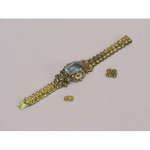 91 - A Continental gold bracelet set with a large central blue stone, in original box, 16cm l (but has tw... 