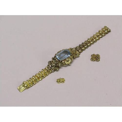 91 - A Continental gold bracelet set with a large central blue stone, in original box, 16cm l (but has tw... 