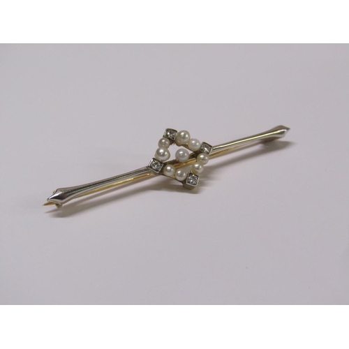 97 - A 15ct gold seed pearl and diamond set  bar brooch, 5cm w, 2.7g.