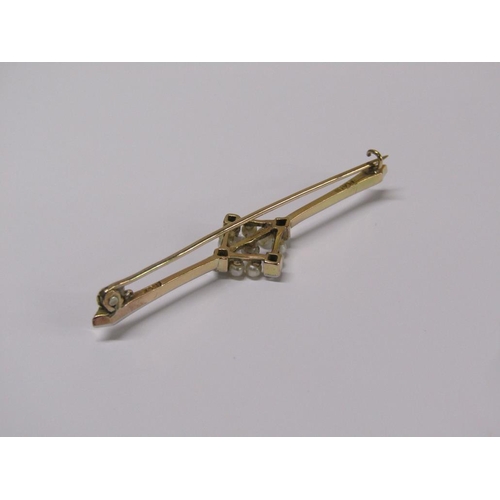 97 - A 15ct gold seed pearl and diamond set  bar brooch, 5cm w, 2.7g.