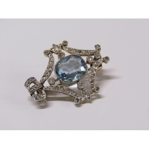 99 - A gold diamond and aquamarine set brooch of bow and swag form, central aquamarine surrounded by grad... 