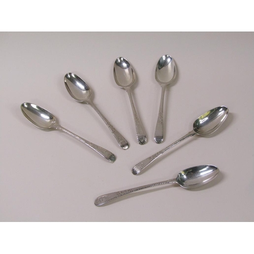 117 - A matched set of six late Georgian silver dessert spoons, date marks rubbed, 6.7ozt.