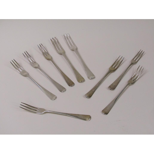 118 - A matched set of nine 18c Georgian silver three prong dessert forks, Old English pattern, 10.2ozt, e... 