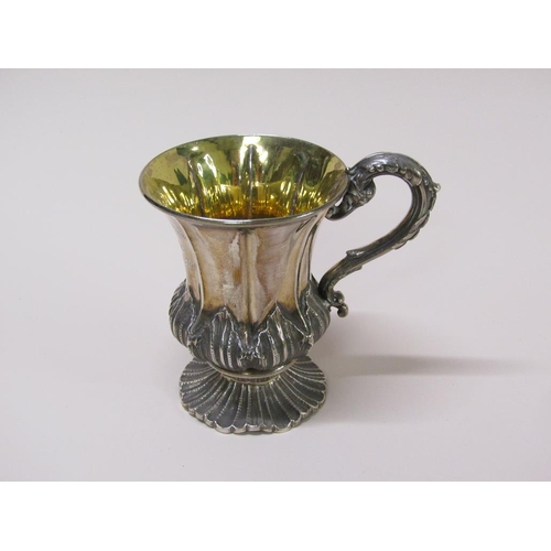 122 - A George IV silver tankard, gilt lined with carved scrolling handle, Sheffield 1825, 4.6ozt, 9.5cm h... 