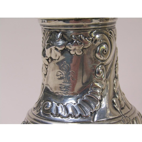 127 - A Georgian garniture of three silver sugar casters, makers mark for Samuel Wood, London 1759, 25.4oz... 