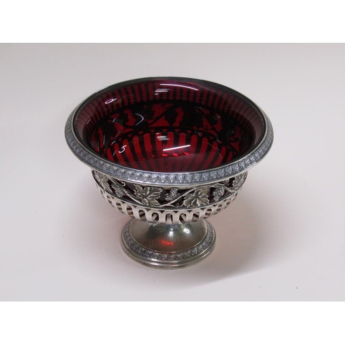 134 - A Continental .800 std silver fruit bowl on stand with a ruby glass liner, makers mark for Friedland... 