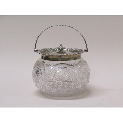 135 - An Edwardian cut glass bowl with silver mounts, lift off cover and swing handle, Sheffield 1906, 21c... 