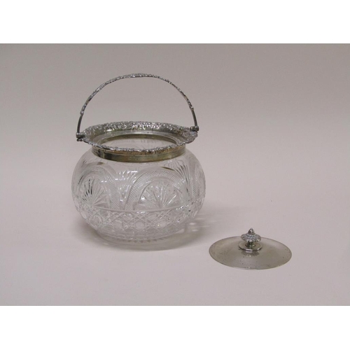 135 - An Edwardian cut glass bowl with silver mounts, lift off cover and swing handle, Sheffield 1906, 21c... 