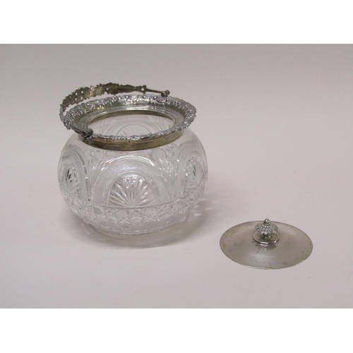 135 - An Edwardian cut glass bowl with silver mounts, lift off cover and swing handle, Sheffield 1906, 21c... 