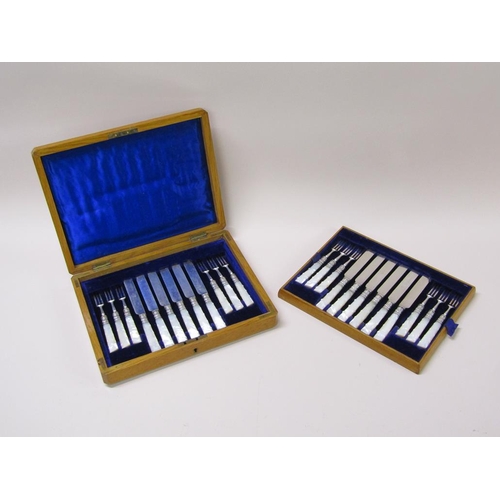 148 - A boxed set of twelve pearl handled silver plated fruit knives and forks in oak box.