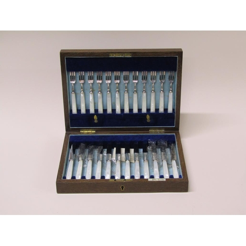 149 - A boxed set of twelve early 20c pearl handled Walker & Hall silver plated fruit knives and forks.