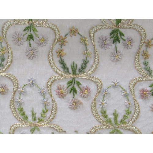 223 - A late 19c/early 20c needlework panel with central open circular cartouche surrounded by bouquets of... 