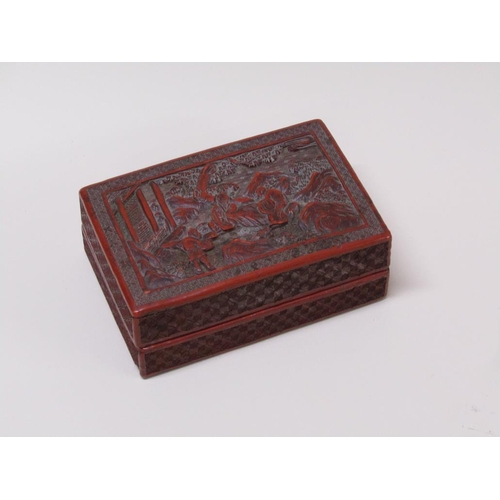 56 - A 19c Chinese cinnabar box, the lift off cover decorated in relief with figures outside a temple, 15... 