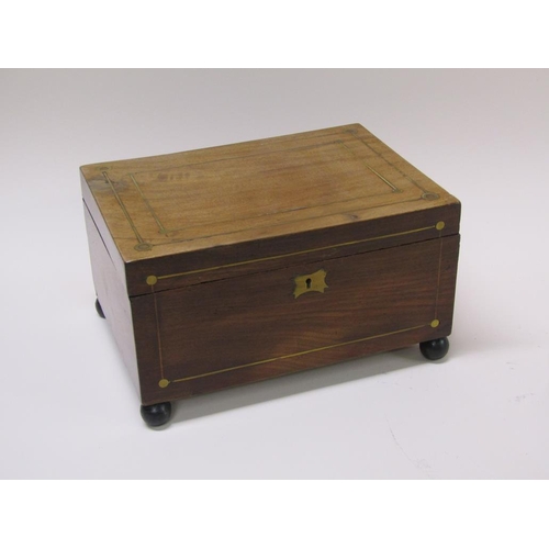 57 - A 19c mahogany needlework box with brass rail inlay, on ball feet, original paper lining with pocket... 