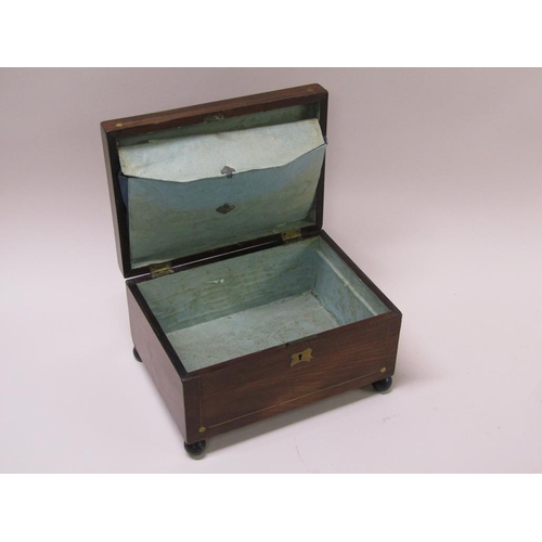 57 - A 19c mahogany needlework box with brass rail inlay, on ball feet, original paper lining with pocket... 