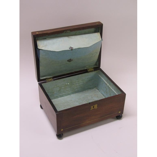 57 - A 19c mahogany needlework box with brass rail inlay, on ball feet, original paper lining with pocket... 