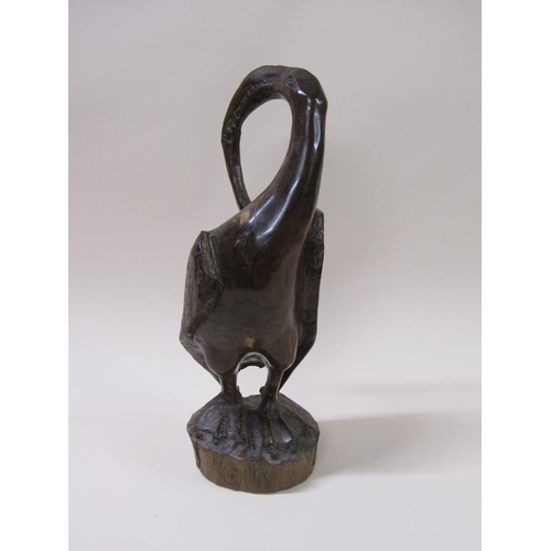 60 - An Umtswili-Leadwood carving of a bird by Lennon Musole, 45cm h.