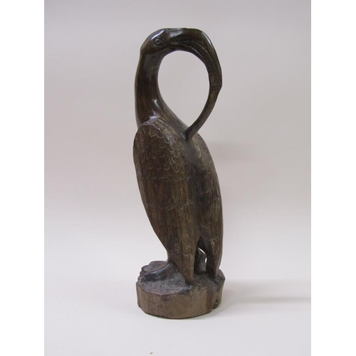 60 - An Umtswili-Leadwood carving of a bird by Lennon Musole, 45cm h.