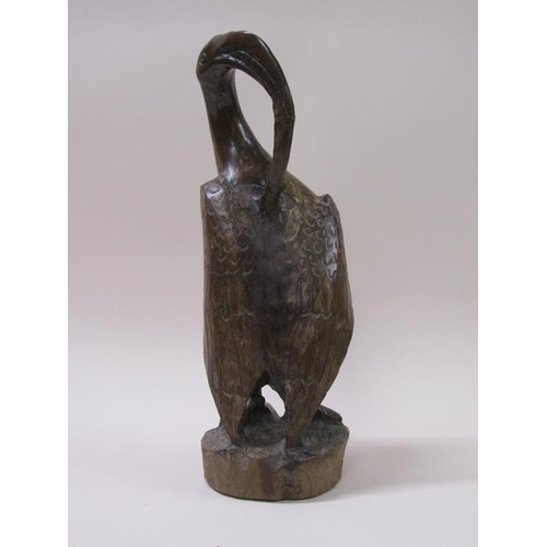 60 - An Umtswili-Leadwood carving of a bird by Lennon Musole, 45cm h.