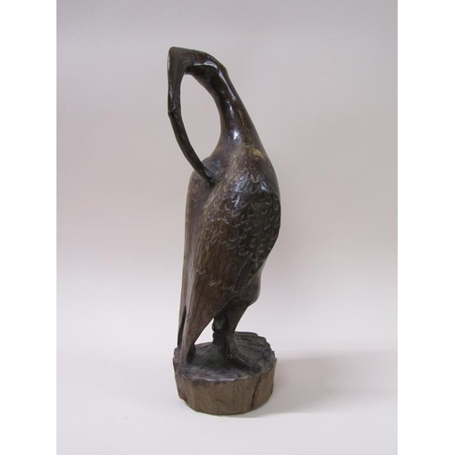 60 - An Umtswili-Leadwood carving of a bird by Lennon Musole, 45cm h.