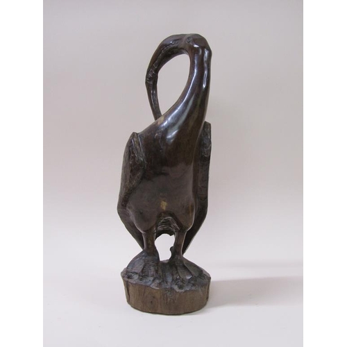 60 - An Umtswili-Leadwood carving of a bird by Lennon Musole, 45cm h.