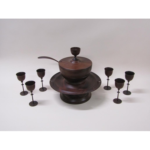 64 - A turned fruit wood wassail bowl on stand with cover, ladle and spice pot, the dished stand carrying... 