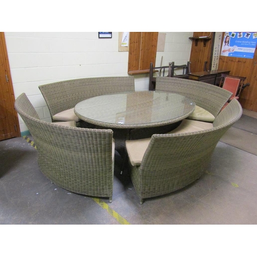 1012 - BRAMBLE CREST RATTAN GARDEN SUITE COMPRISING LARGE TABLE AND CURVED BENCH SEATING