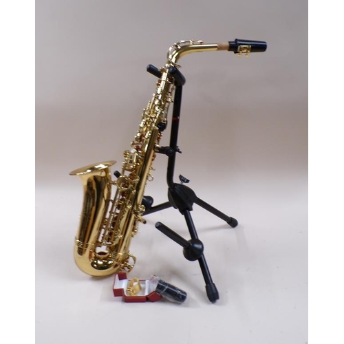 1371 - SAXOPHONE IN CASE AND STAND