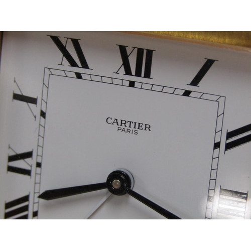 1494 - CARTIER TRAVEL ALARM CLOCK IN A FITTED BOX WITH GUARANTEE CARD, CLOCK IS NUMBERED 750500990