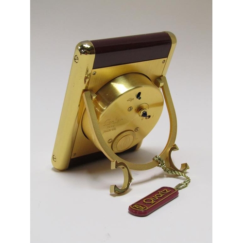 1494 - CARTIER TRAVEL ALARM CLOCK IN A FITTED BOX WITH GUARANTEE CARD, CLOCK IS NUMBERED 750500990