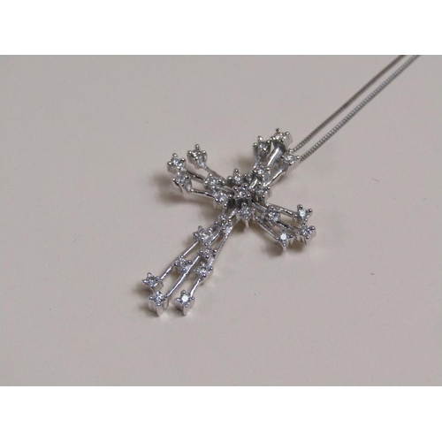 1596 - 9ct WHITE GOLD DIAMOND SET PENDANT CRUCIFIX AND CHAIN - 3.5g