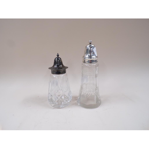 1718 - SILVER TOP CUT GLASS SHAKER AND A SILVER PLATED CUT GLASS SHAKER