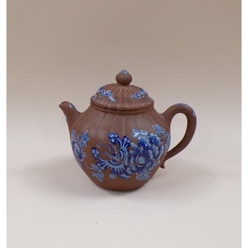 1803 - ORIENTAL TERRACOTTA TEAPOT WITH ENAMEL BLUE DECORATION,  A/F, 13CM H