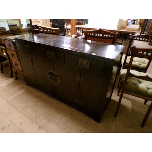 1956 - CHINESE STYLE LOW CABINET FITTED WITH THREE FRIEZE DRAWERS OVER CABINET BASE WITH CHINESE LOCK AND F... 