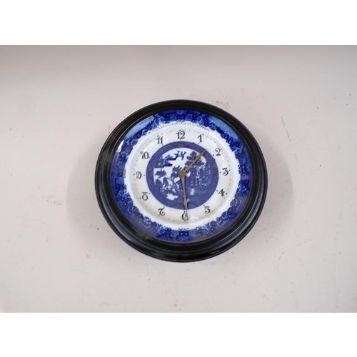 1448 - BLUE AND WHITE PLATE CLOCK BY T RUSSELL, 18 CHURCH ST LIVERPOOL, 23cms DIA