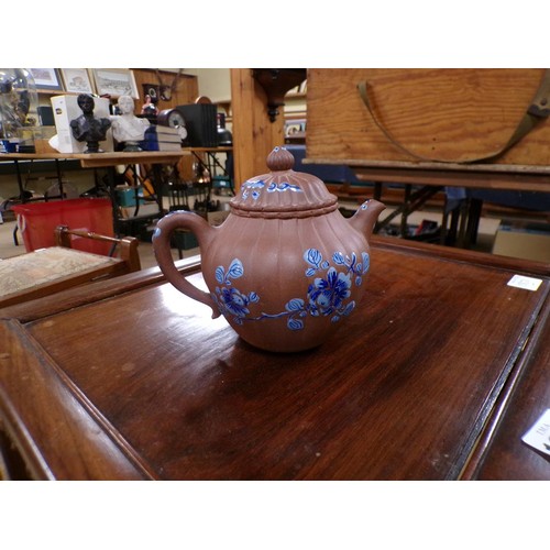 1803 - ORIENTAL TERRACOTTA TEAPOT WITH ENAMEL BLUE DECORATION,  A/F, 13CM H