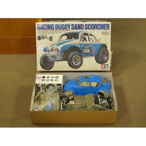 1293 - TAMIYA REMOTE CONTROLLED RACING BUGGY SAND SCORCHER AND BOX OF BODY PART SET; KYOSHO FORD GT40 RADIO... 