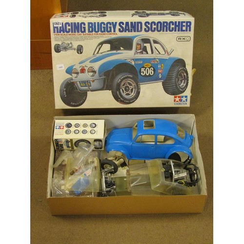 1293 - TAMIYA REMOTE CONTROLLED RACING BUGGY SAND SCORCHER AND BOX OF BODY PART SET; KYOSHO FORD GT40 RADIO... 